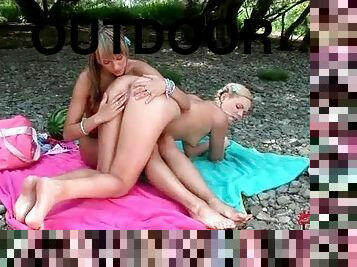 Teens in pigtails have sex on the beach