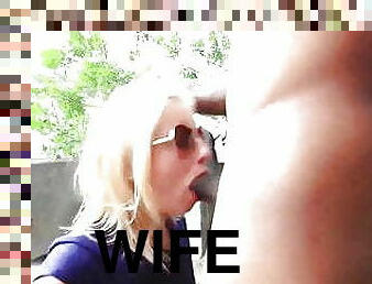 Blonde wife with sunglasses sucks black cock outside
