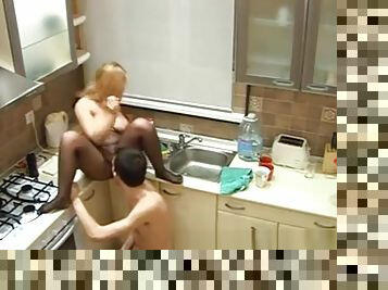 Playing With Wife On Kitchen Counter