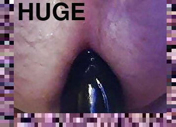 Huge dildo in my ass