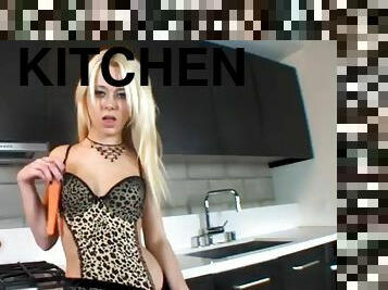 Dazzling blonde in lingerie masturbating in the kitchen