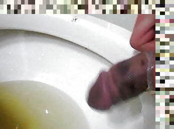 CBT broken cock pissing and wanking in condoms