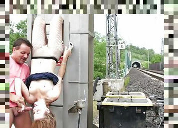 Public sex by the train tracks with a naughty slut in fishnets