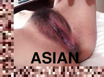 Asian slut gets her hairy muff penetrated and massaged