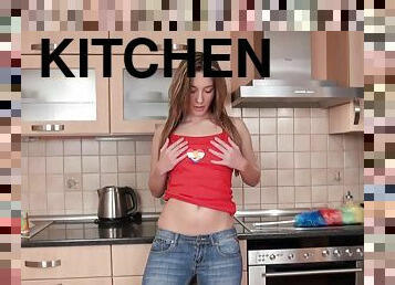 Naked hto woman masturbates in the kitchen