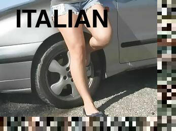 Stunning Italian chick with sexy white toenails showing off her pretty feet