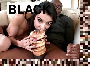 Brunette slut blowing on a long and fat black man stick