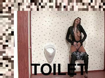 Messy girl gets showered with cum in a toilet gloryhole