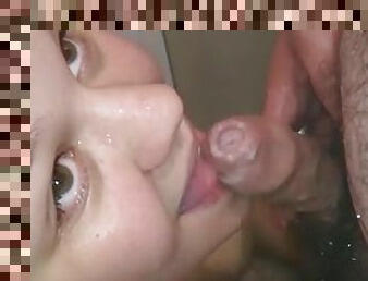 Chubby brunette gives head to her man in the shower