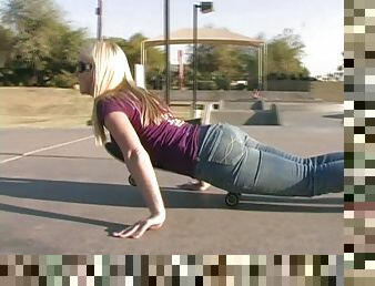 Affectionate blonde in jeans skating lovely in reality shoot outdoor