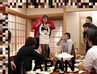 Japanese girl enjoys a gangbang with her co-workers