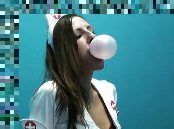 Horny Nurse MILF In Her Hot Uniform Makes Bubbles With Her Gum