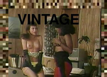 Vintage lesbian porn featuring busty brunette Ebony Eyes