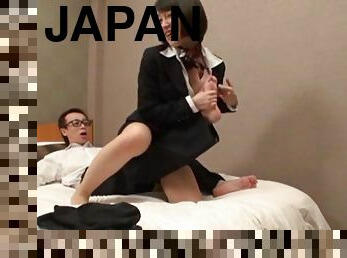 Japanese milf lets a man play with her tits and jumps on his dick