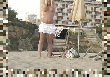 Striking Alison Angel Takes Her Clothes Off On The Beach