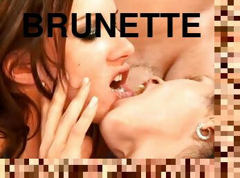 Two lustful brunette girls get fucked in their pussies and asses