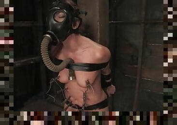 Girl in a gas mask on her head gets humiliated in femdom vid