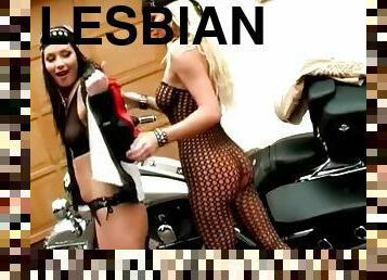 Sexy Evelyn Lory and Silvia Saint toy each other's vags near a bike