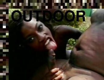 Hardcore outdoor with a charming ebony sex doll