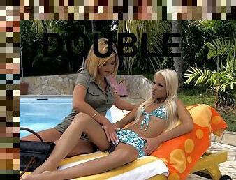 Two blonde skanks share a double dildo on the poolside