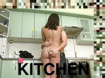 Brunette girl gets fucked and jizzed on her tits in a kitchen