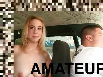 Teenage blonde getting topless in the sex bus