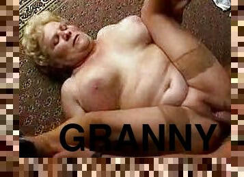 Lewd granny sucks a cock and gets fucked in the hall