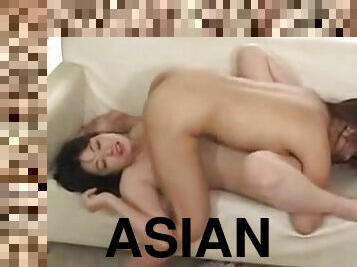 Two Asian lesbians enjoys touching and licking each other's vags