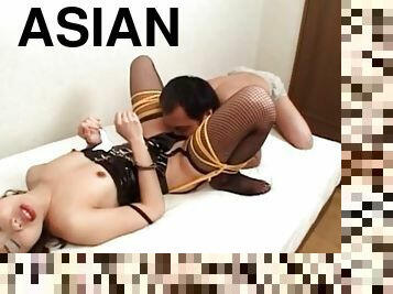 Tied up slutty asian gets tits and cunt licked in bed