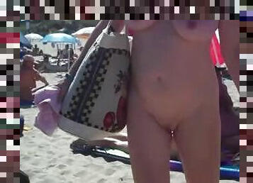 Spy cam catches a woman sucking a dick on a nude beach