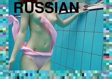 Pink swimsuit babe Liza Bubarek stripping underwater