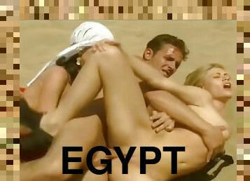 Two sexy girls get fucked hard in Egyptian desert