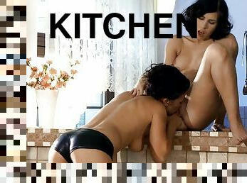 Sexy brunettes licking each other's pussies in the kitchen