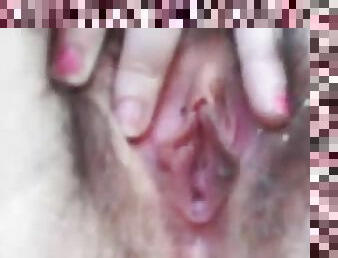 A Hairy Pussy Gets Masturbated In A Close Up Clip