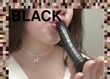 Brunette sucks black cock