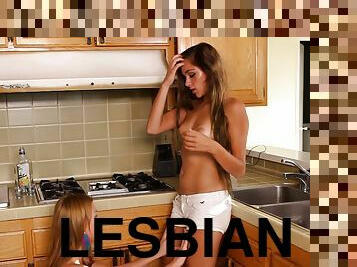 Very horny lesbian babes going down on each other on the kitchen floor