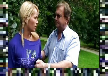 Shorts-clad blonde with pigtails getting her shaved pussy fingered by an old man