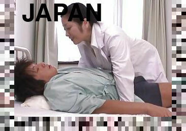 Naughty Japanese doctor Minako Komukai enjoys sucking patient's dick