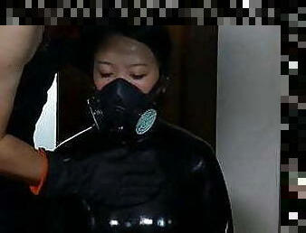 Fejira com The slave girl in latex tights was given a blindf
