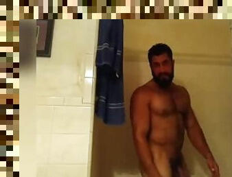 Hot Bodybuilder Flexing in Shower
