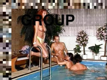 Pool party group sex among hot babes and horny guys in vintage clip
