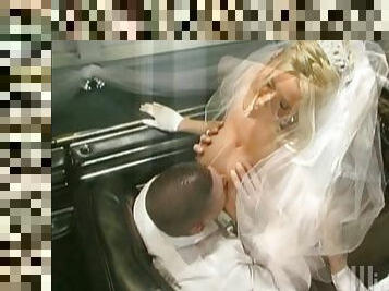 A busty bride gets fucked in the car