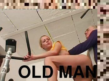 Beautiful teen with blonde hair sucking an old man's cock