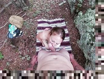 Redhead with big boobs sucks dick and swallows load in the woods