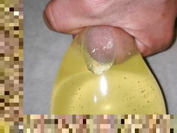 Filling condom with piss