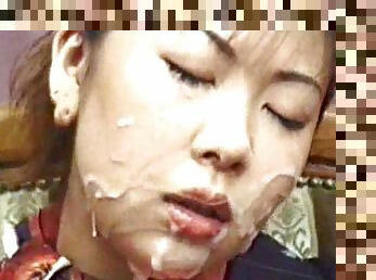 Japanese girl gets messy in bukkake
