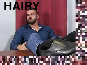 Hairy hunk jerks off dick and cums while showing his feet