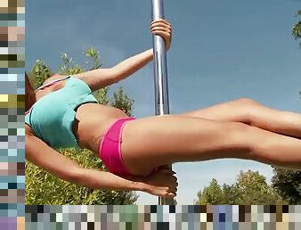 Krystal webb stripteases on a pole outdoors