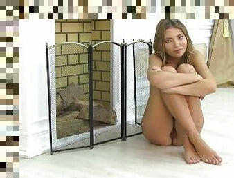Lovely Nubile Model Poses Naked by the Fireplace - Full Video!