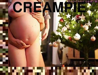 Pregnant girl decorates a Christmas tree and gets creampie